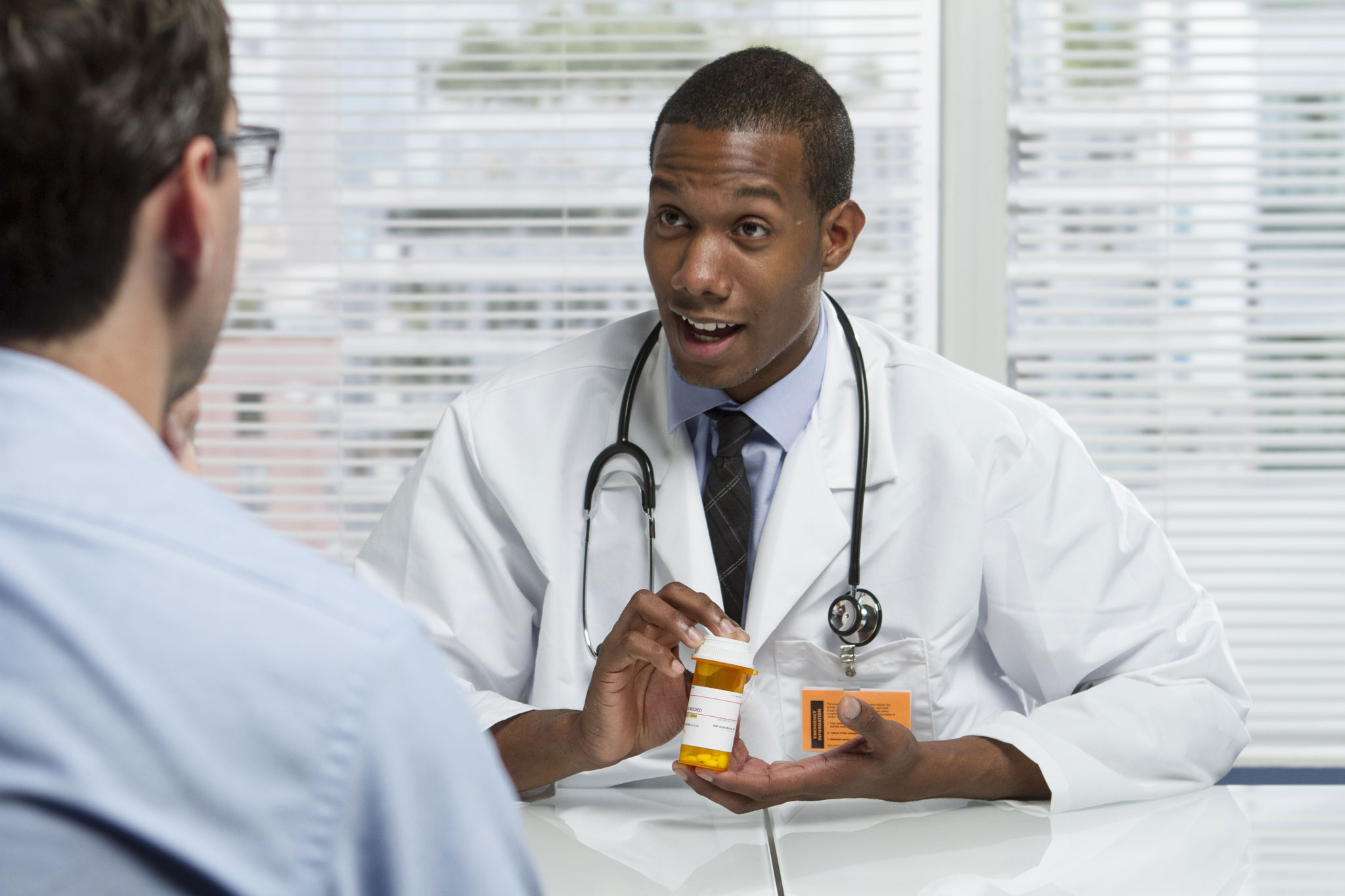 Doctor advising patient